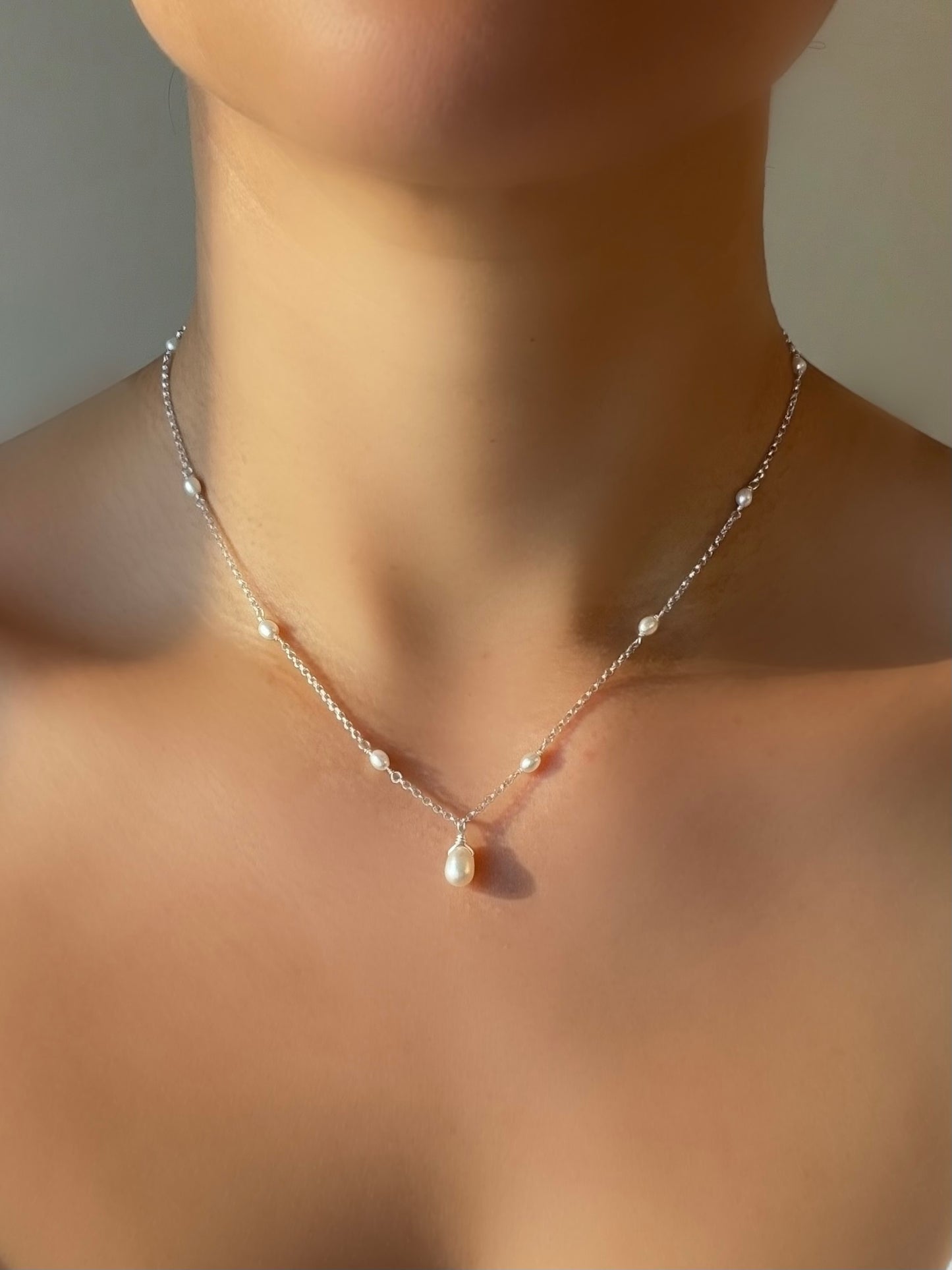 Bridal pearl necklace with a teardrop pearl dangle